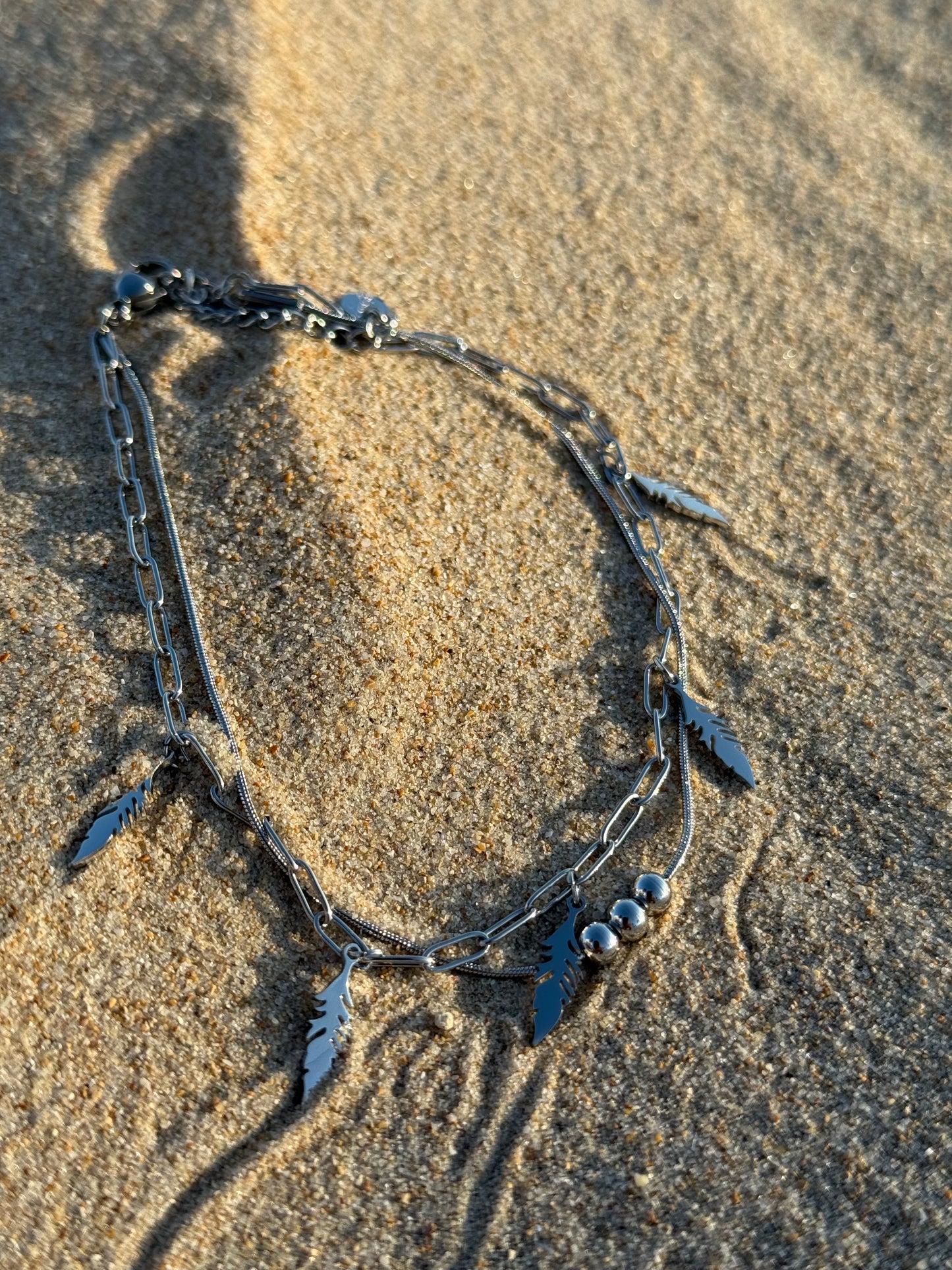 Tobillera Pluma